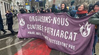 Protesters gather in Brussels to demonstrate their opposition to sexual assault and violence against women, 28 Nov 2021.