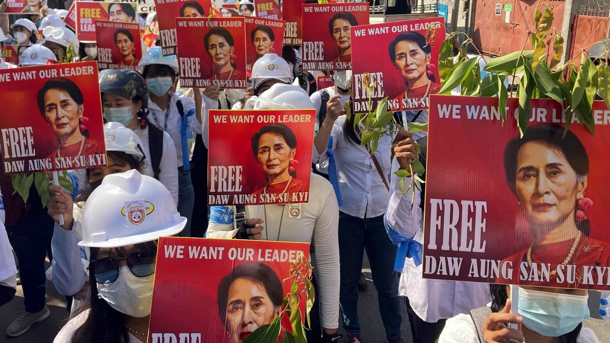 FILE - Protesters hold portraits of deposed Myanmar leader Aung San Suu Kyi during an anti-coup demonstration in Mandalay, Myanmar on March 5, 2021. 