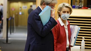 European Commissioner for Economics Paolo Gentiloni talks with President of the European Commission Ursula von der Leyen at the College of Commissioners in Brussels, Wednesday