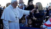 Pope Francis arrives at the airport in Larnaca, Cyprus, for his five-day visit.