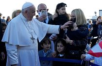 Pope Francis arrives at the airport in Larnaca, Cyprus, for his five-day visit.