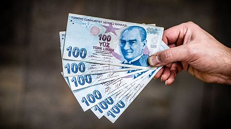 The Turkish Lira is at an all-time low, forcing citizens to convert their savings into gold or foreign currencies to avoid inflation.