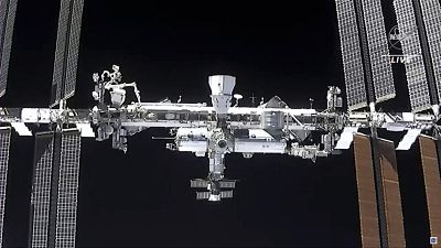 This image made from NASA TV shows the international space station, seen from the SpaceX Crew Dragon spacecraft Saturday, April 24, 2021.