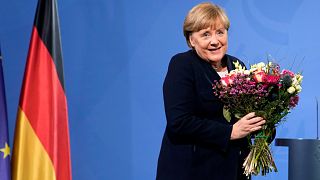 Chancellor Angela Merkel during a handover ceremony in the chancellery in Berlin, Wednesday, Dec. 8, 2021. 