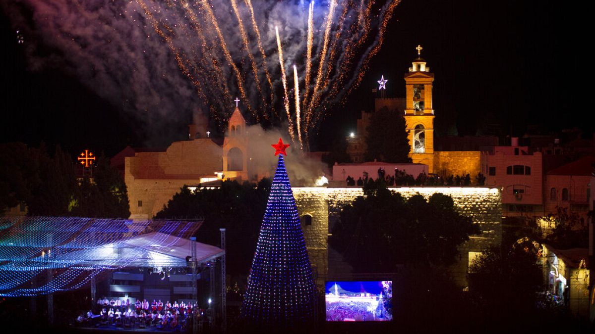 Famed Manger Square Christmas tree lit up