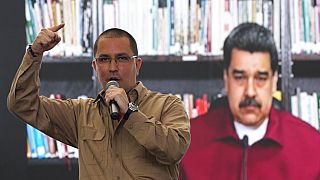 Jorge Arreaza en primer plano, con el presidente venezolano Nicolás Maduro detrás, durante el acto de presentación de su candidatura a gobernador de Barinas