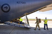 In this image released by the New Zealand Defense Force, crew prepare to depart on a C-130 Hercules from Ohakea, New Zealand, Dec. 2, 2021, bound for Solomon Islands.