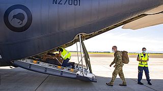 In this image released by the New Zealand Defense Force, crew prepare to depart on a C-130 Hercules from Ohakea, New Zealand, Dec. 2, 2021, bound for Solomon Islands.
