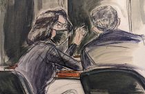 In this sketch, Ghislaine Maxwell, seated left speaks to her defense attorney Christian Everdell prior to the testimony of "Kate,"during the trial of Ghislaine Maxwell.