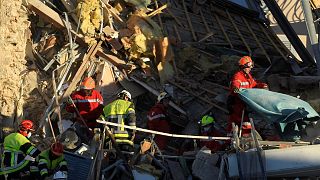 French firefighters search the rubble for missing inhabitants after a building collapsed in Sanary-sur-Mer, on December 7, 2021.
