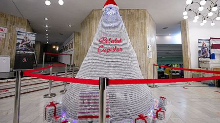 The 3-metre tall Christmas tree is made from 19,000 empty COVID-19 vaccine containers