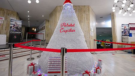 The 3-metre tall Christmas tree is made from 19,000 empty COVID-19 vaccine containers  