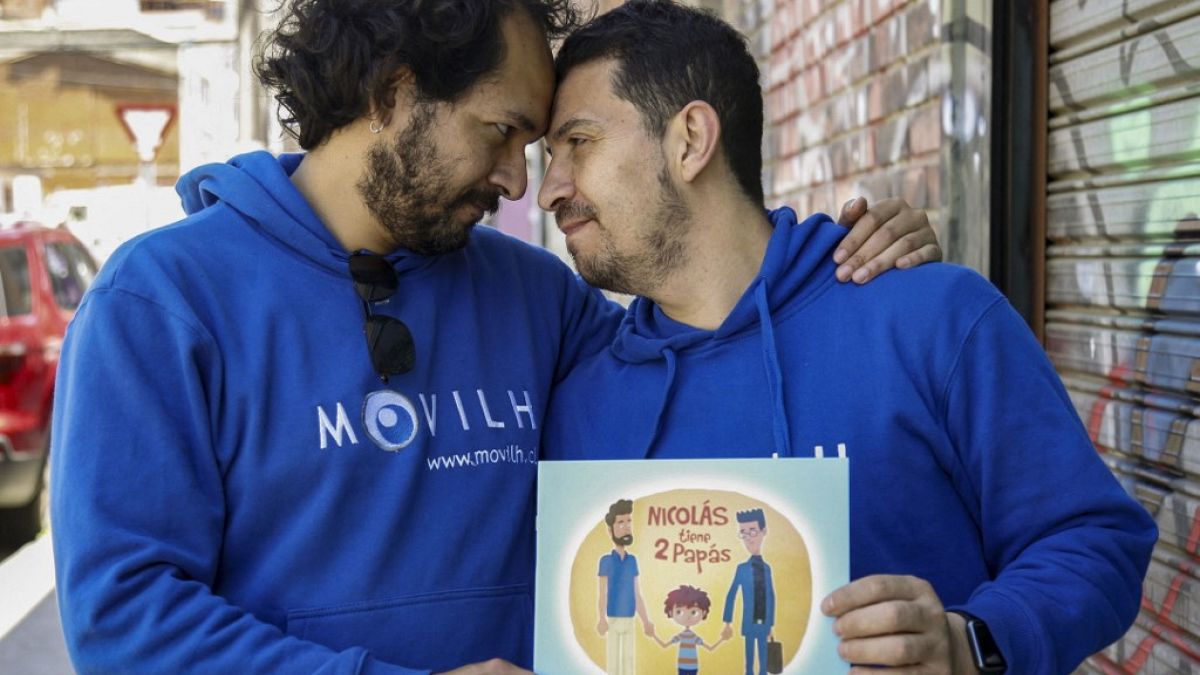 Chilean activists Ramon Gomez (L) and Gonzalo Velasquez, a couple of 21 years who for years have been fighting for marriage equality
