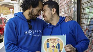 Chilean activists Ramon Gomez (L) and Gonzalo Velasquez, a couple of 21 years who for years have been fighting for marriage equality