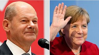 Olaf Scholz, right, and his predecessor, Angela Merkel, right