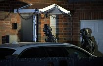 German police search an apartment in Ritterhude early on Wednesday.