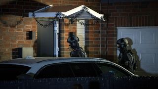 German police search an apartment in Ritterhude early on Wednesday.