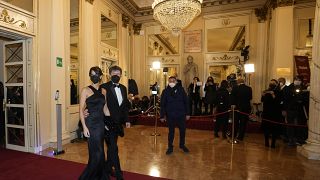 Italian Culture Minister Dario Franceschini arrives with his wife Michela Di Biase for the premiere of Verdi's Macbeth at La Scala opera house in Milan, Italy, Dec. 7, 2021.
