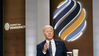 President Joe Biden speaks from the South Court Auditorium on the White House complex in Washington, Thursday, Dec. 9, 2021, for the opening of the Democracy Summit.