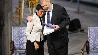 Nobel Peace Prize winners Dmitry Muratov from Russia, right, and Maria Ressa of the Philippines during the Nobel Peace Prize ceremony at Oslo City Hall, Norway, Dec. 10, 2021.