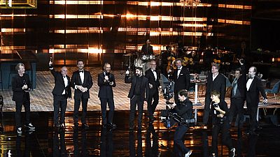 Winners of the Excellence awards stand on stage during the 2018 European Film Awards ceremony at the Maestranza Theatre in Sevilla on December 15, 2018.