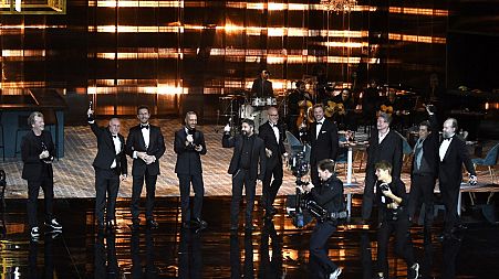 Winners of the Excellence awards stand on stage during the 2018 European Film Awards ceremony at the Maestranza Theatre in Sevilla on December 15, 2018.
