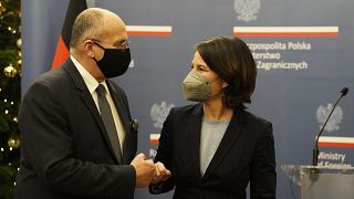 Der polnische Außenminister Zbigniew Rau und die neue deutsche Chefdiplomatin Annalena Baerbock.
