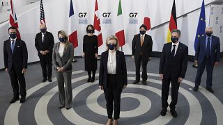 G7 foreign ministers, pose in a socially distanced manner for a group photo at the Museum of Liverpool, Liverpool, England, Saturday Dec. 11, 2021.