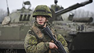 A Russian army soldier takes part in drills at the Kadamovskiy firing range in the Rostov region in southern Russia, Friday, Dec. 10, 2021.