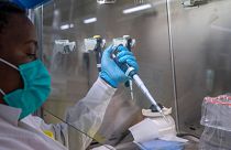 Puseletso Lesofi prepares to sequence COVID-19 omicron samples at the Ndlovu Research Centre in Elandsdoorn, South Africa, Dec. 8, 2021.
