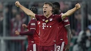 Bayern's Joshua Kimmich celebrates after the German Bundesliga soccer match between FC Bayern Munich and SC Freiburg in Munich, Germany, Saturday, Nov. 6, 2021.