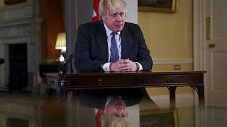 Le Premier ministre britannique Boris Johnson lors de son allocution télévisée, annonçant un "raz-de-marée Omicron", le 12 décembre 2021