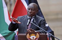 South African President Cyril Ramaphosa addresses the media after meeting with his Kenyan counterpart Uhuru Kenyatta in Pretoria, South Africa, Tuesday Nov. 23, 2021.