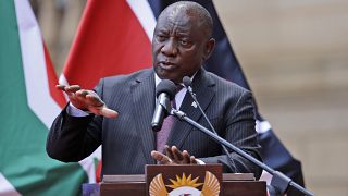 South African President Cyril Ramaphosa addresses the media after meeting with his Kenyan counterpart Uhuru Kenyatta in Pretoria, South Africa, Tuesday Nov. 23, 2021.