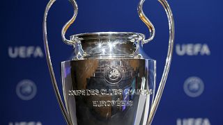 The UEFA Champions League trophy is displayed at the UEFA headquarters in Nyon, Switzerland.
