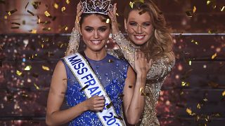 Miss Ile-de-France Diane Leyre is crowned by Miss France 2021 Amandine Petit at the end of the the Miss France 2022 beauty contest in Caen, on December 11, 2021.