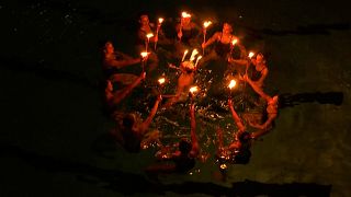 The annual Santa Lucia celebrations of darkness and light at the Västertorp swimming pool