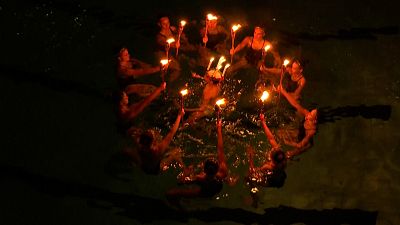 The annual Santa Lucia celebrations of darkness and light at the Västertorp swimming pool
