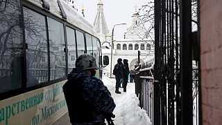 Police officers stand guard at the Vvedenskiy Vladychniy convent in Serpukhov