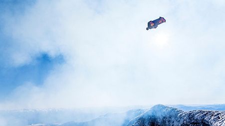 Sebastian Alvarez wingsuits over a volcano in Pucón, Chile