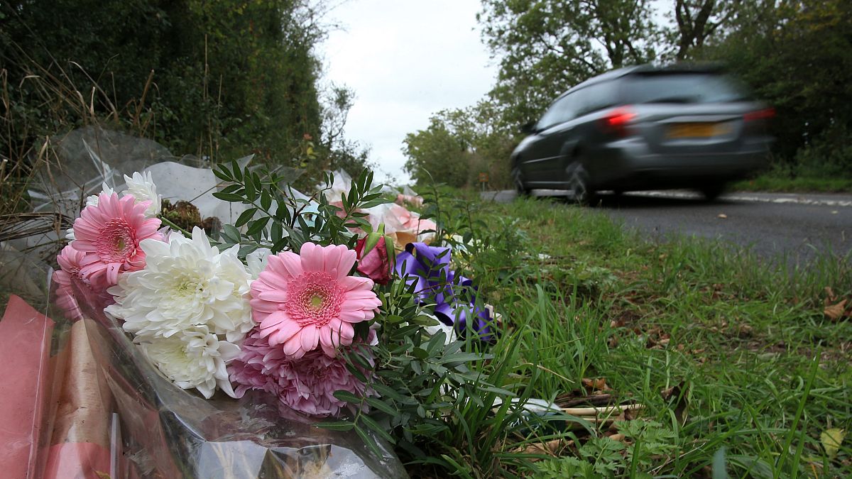 Flowers left at the scene following Harry Dunn's death