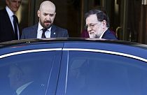 El expresidente del Gobierno de España entrando a un coche
