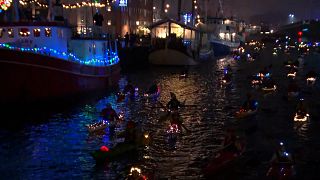Festive kayaks in Santa Lucia procession on Copenhagen canals