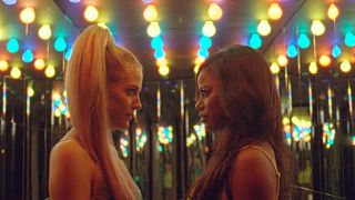 This image released by A24 shows Riley Keough, left, and Taylour Paige in a scene from "Zola." 