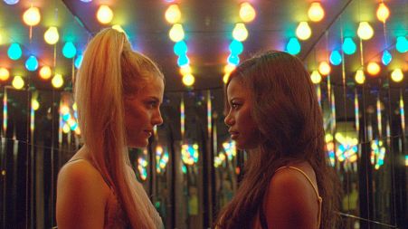 This image released by A24 shows Riley Keough, left, and Taylour Paige in a scene from "Zola."