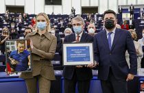 Daria Navalnaya receives the Sakharov Prize, the European Union's top human rights prize, on behalf of her father in Strasbourg, France, Wednesday, Dec. 15, 2021.