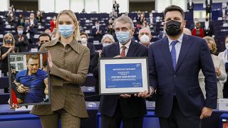 Daria Navalnaya receives the Sakharov Prize, the European Union's top human rights prize, on behalf of her father in Strasbourg, France, Wednesday, Dec. 15, 2021.