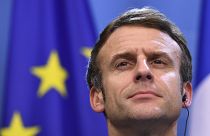French President Emmanuel Macron addresses a media conference at the conclusion of an EU Summit in Brussels, Friday, Dec. 17, 2021.