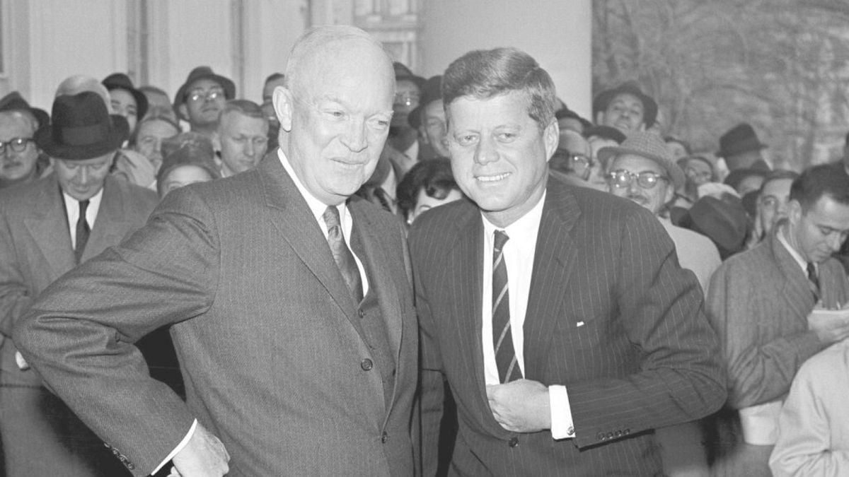 President Dwight Eisenhower poses with President-elect John F. Kennedy at the White House