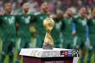 The FIFA Arab Cup trophy takes centre stage ahead of the final between Algeria and Tunisia